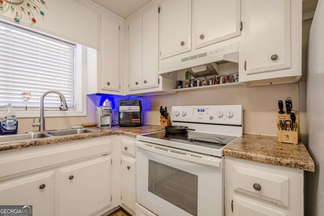 200 Villa Rd Unit 103, Jasper, GA 30143 - kitchen with white range with electric stovetop, a sink, under cabinet range hood, and white cabinets