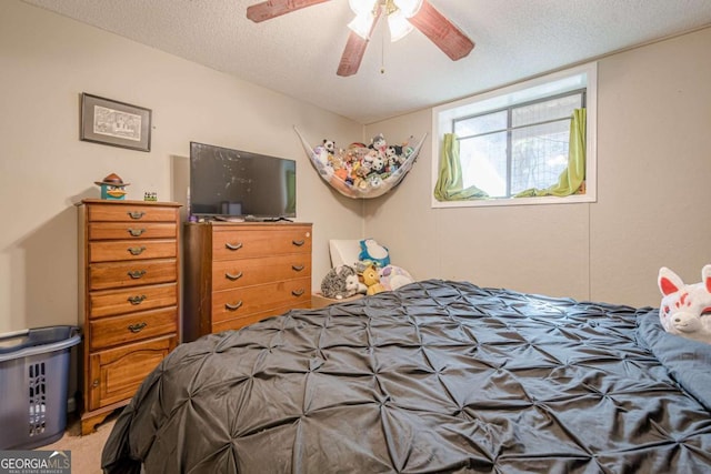 200 Villa Rd Unit 103, Jasper, GA 30143 - bedroom with light colored carpet, a textured ceiling, and a ceiling fan