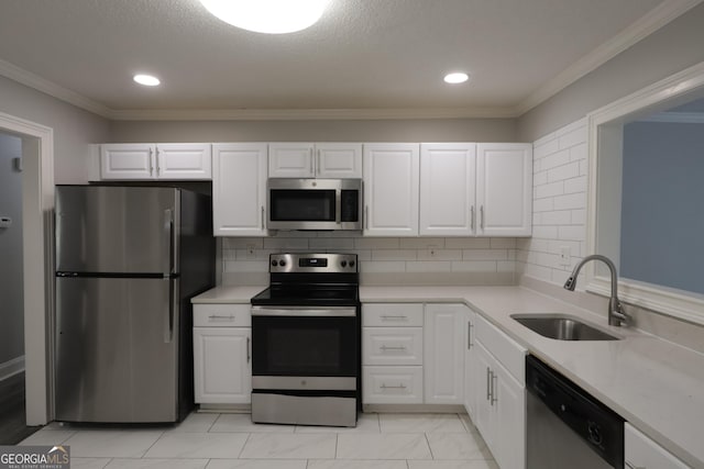 3363 Wesley Chapel Rd, Decatur, GA 30034 - kitchen featuring light countertops, a sink, white cabinets, and appliances with stainless steel finishes