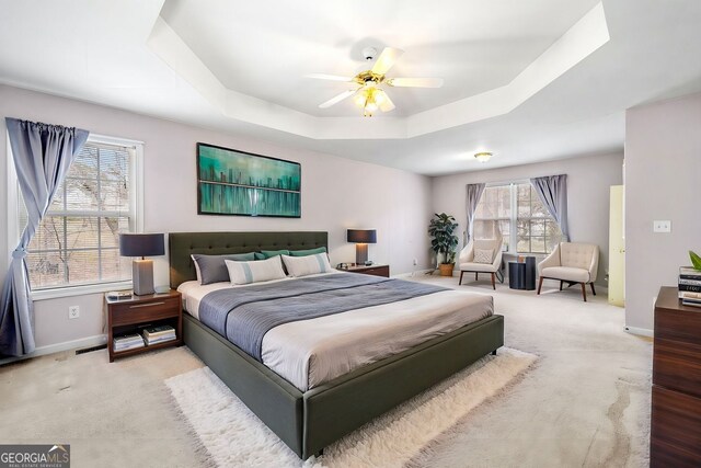 57 Sorghum Ct, Dallas, GA 30157 - bedroom with baseboards, a raised ceiling, multiple windows, and a ceiling fan