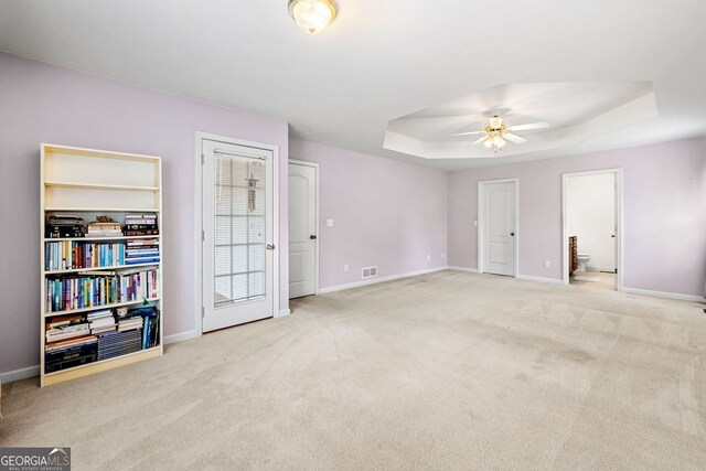 57 Sorghum Ct, Dallas, GA 30157 - unfurnished bedroom with a raised ceiling, carpet floors, baseboards, and ensuite bathroom