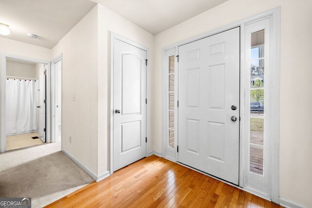 57 Sorghum Ct, Dallas, GA 30157 - foyer entrance with baseboards and light wood finished floors
