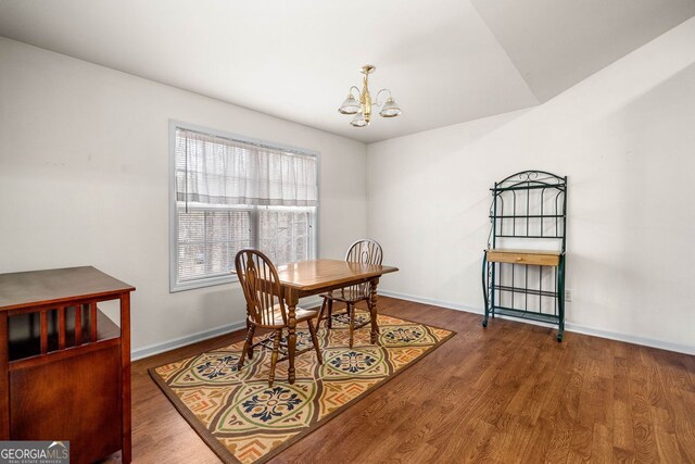 57 Sorghum Ct, Dallas, GA 30157 - dining room featuring a chandelier, wood finished floors, and baseboards