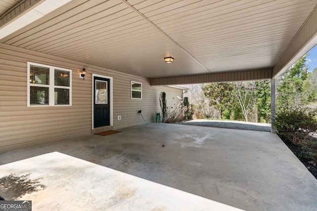 view of patio with a carport