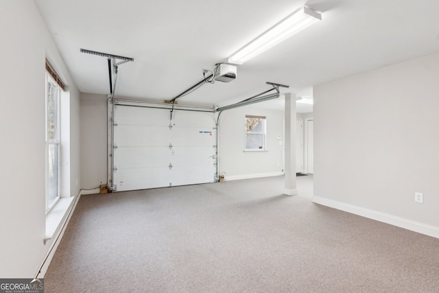 garage featuring baseboards and a garage door opener