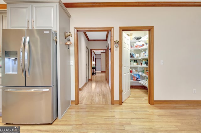 165 Hideaway Dr, Fayetteville, GA 30215 - kitchen with stainless steel fridge, ornamental molding, and light wood-style floors