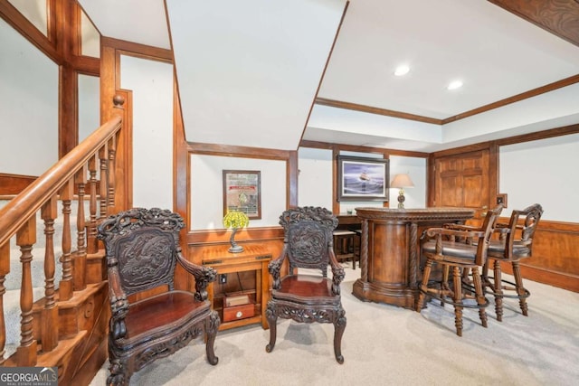 bar with crown molding, a bar, recessed lighting, carpet floors, and a tray ceiling