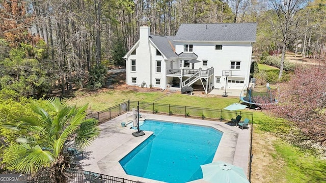 back of house featuring a lawn, a patio, and fence private yard