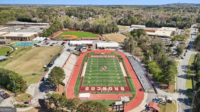 drone / aerial view featuring a view of trees
