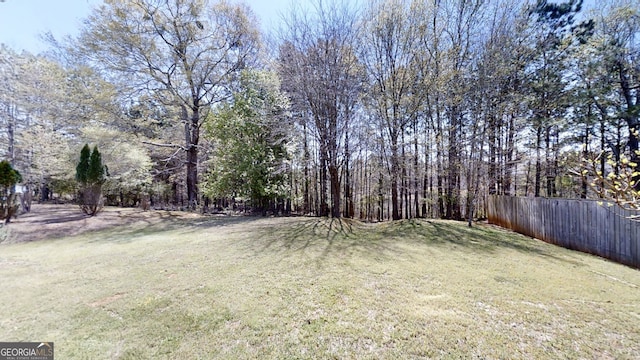 view of yard featuring fence