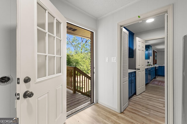 5697 Yatesville Hwy, Yatesville, GA 31097 - doorway to outside featuring light wood-style flooring, baseboards, ornamental molding, and visible vents