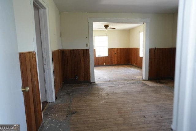 319 Isabella St, Abbeville, GA 31001 - hall with a wainscoted wall, wood finished floors, and wooden walls