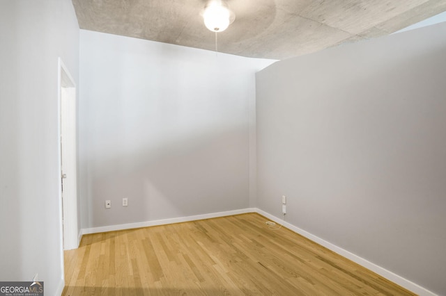 943 Peachtree St NE Unit 1003, Atlanta, GA 30309 - unfurnished room with wood finished floors and baseboards