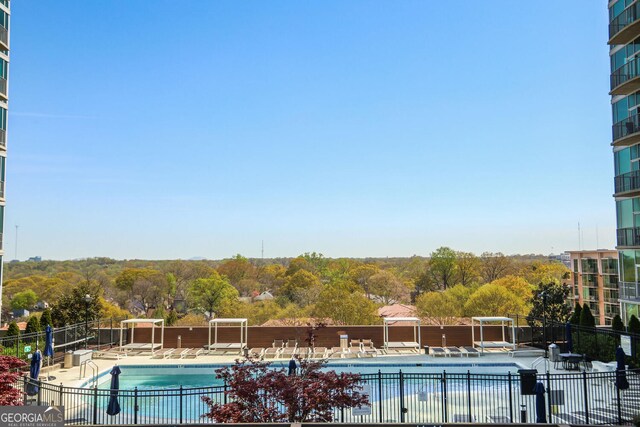 943 Peachtree St NE Unit 1003, Atlanta, GA 30309 - community pool featuring a patio