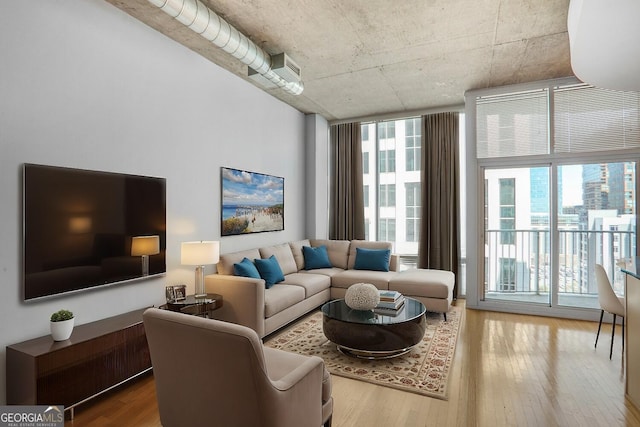 943 Peachtree St NE Unit 1003, Atlanta, GA 30309 - living area with wood finished floors