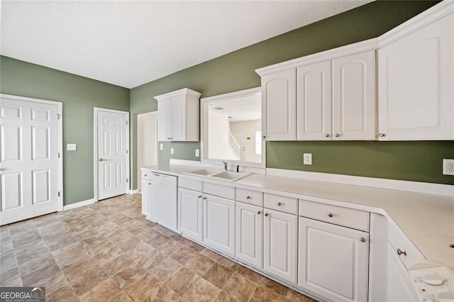 258 Venture Path, Hiram, GA 30141 - kitchen featuring dishwasher, white cabinetry, light countertops, and stone finish flooring