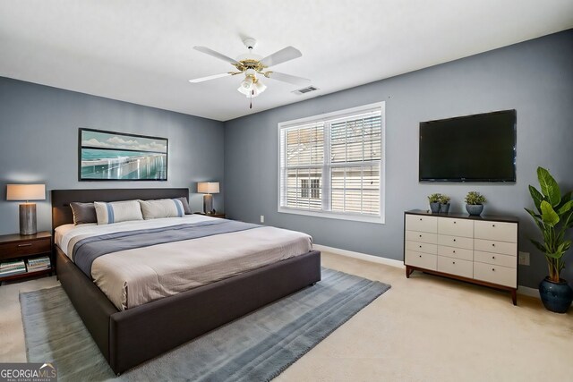 258 Venture Path, Hiram, GA 30141 - bedroom with light carpet, baseboards, and ceiling fan
