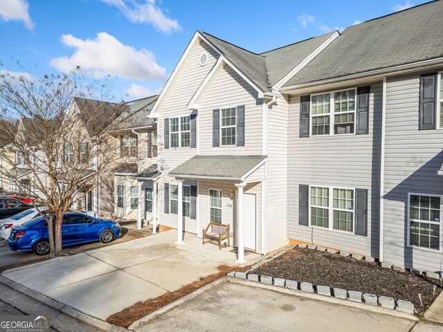258 Venture Path, Hiram, GA 30141 - view of property featuring roof with shingles