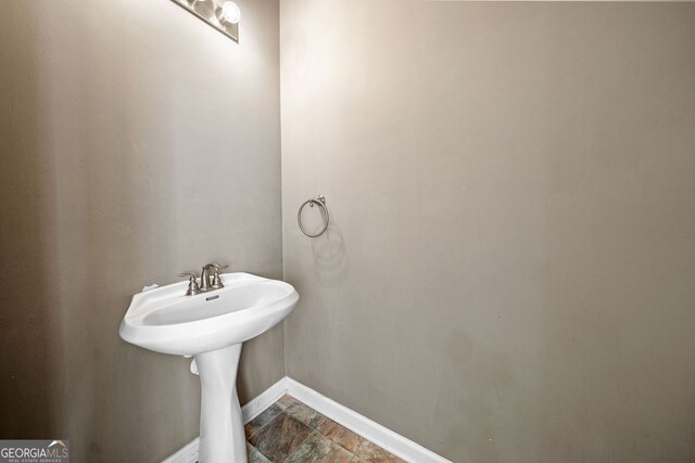258 Venture Path, Hiram, GA 30141 - bathroom with baseboards and a sink