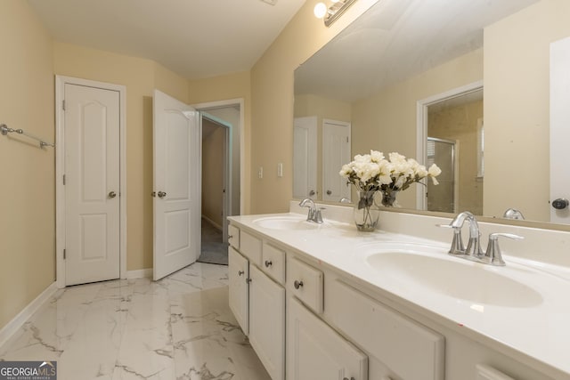 3450 Long Lake Dr, Douglasville, GA 30135 - full bathroom featuring a sink, baseboards, marble finish floor, and a stall shower