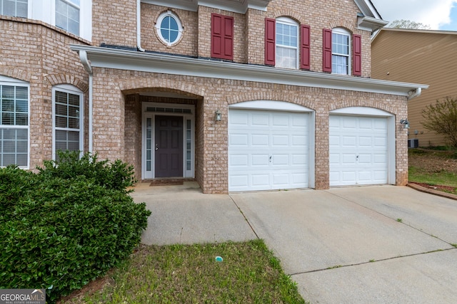3450 Long Lake Dr, Douglasville, GA 30135 - exterior space with brick siding, a garage, and concrete driveway