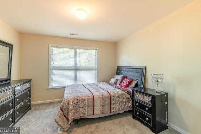 3450 Long Lake Dr, Douglasville, GA 30135 - bedroom featuring light colored carpet, baseboards, and visible vents
