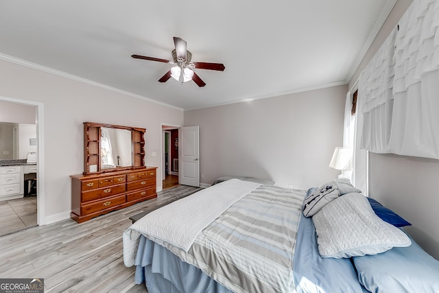 bedroom featuring light wood-style flooring, ornamental molding, and a ceiling fan
