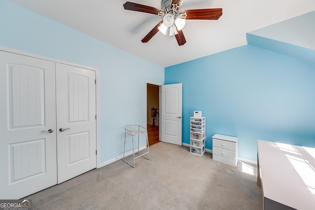 bedroom with carpet, a closet, a ceiling fan, and baseboards