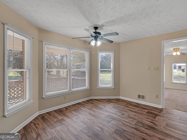 105 Overlook Dr, Mcdonough, GA 30252 - empty room with ceiling fan, wood finished floors, and a textured ceiling