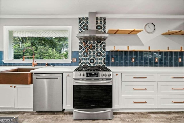 215 Collum St NW, Atlanta, GA 30314 - kitchen featuring a sink, open shelves, appliances with stainless steel finishes, wall chimney range hood, and ornamental molding