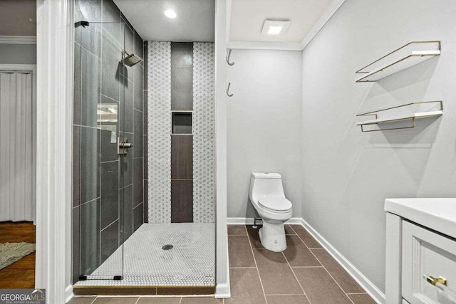 215 Collum St NW, Atlanta, GA 30314 - bathroom featuring baseboards, toilet, a stall shower, and crown molding