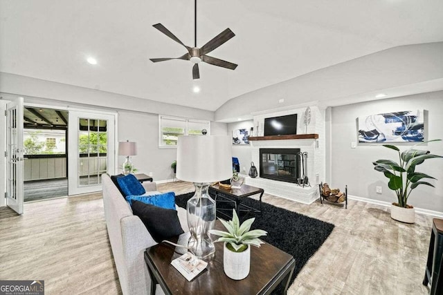 215 Collum St NW, Atlanta, GA 30314 - living area featuring baseboards, a fireplace, wood finished floors, a ceiling fan, and lofted ceiling