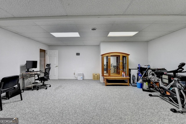 office with carpet flooring, a drop ceiling, and baseboards