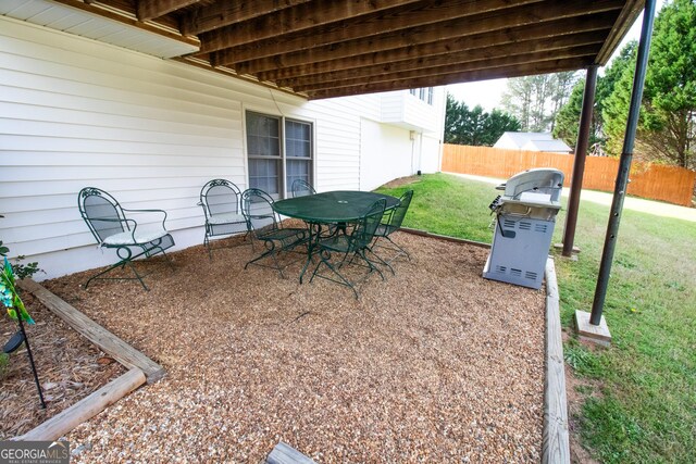 view of patio / terrace with fence and outdoor dining area
