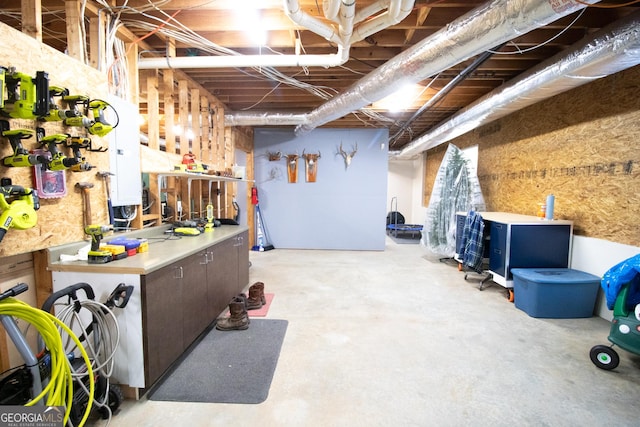 unfinished basement with a workshop area