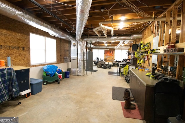 below grade area featuring water heater