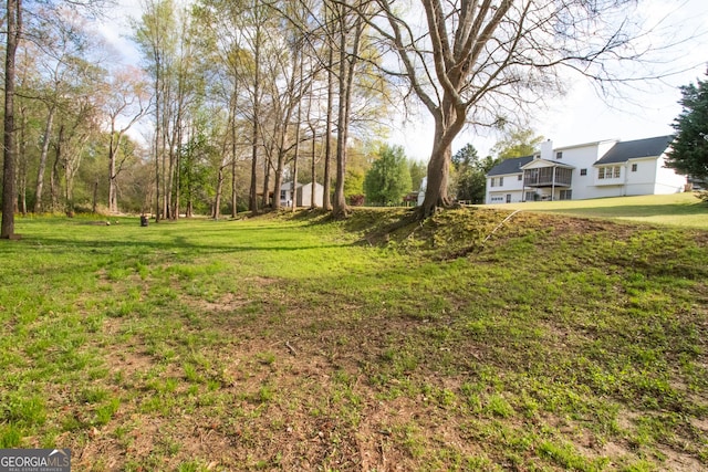 view of yard featuring a garage
