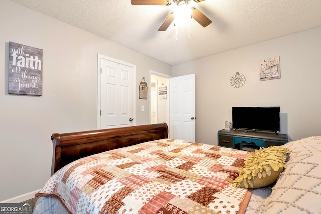 181 King St, Clermont, GA 30527 - bedroom with ceiling fan and baseboards