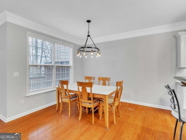 5454 Alanis Pl SE Unit 19, Mableton, GA 30126 - dining room featuring a chandelier, ornamental molding, and light wood-style floors