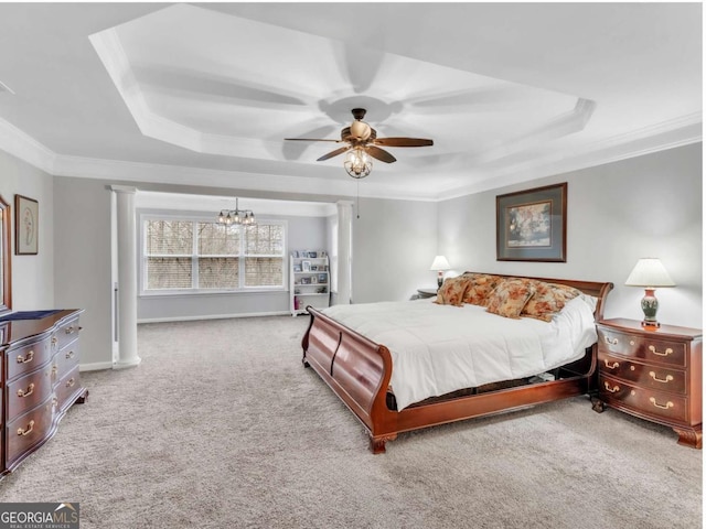 5454 Alanis Pl SE Unit 19, Mableton, GA 30126 - carpeted bedroom with a tray ceiling, crown molding, a chandelier, ornate columns, and a ceiling fan