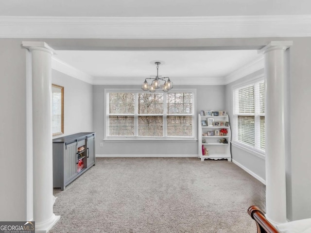 5454 Alanis Pl SE Unit 19, Mableton, GA 30126 - carpeted dining area with decorative columns, a chandelier, and crown molding