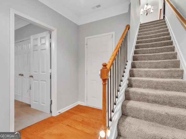 5454 Alanis Pl SE Unit 19, Mableton, GA 30126 - stairway featuring a chandelier and carpet floors