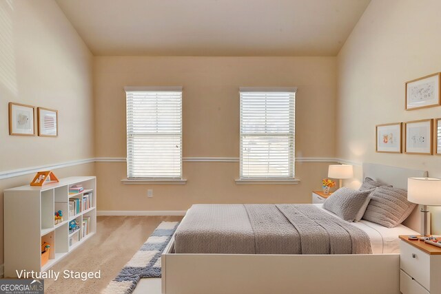 2205 Capella Cir SW, South Fulton, GA 30331 - carpeted bedroom featuring baseboards and multiple windows