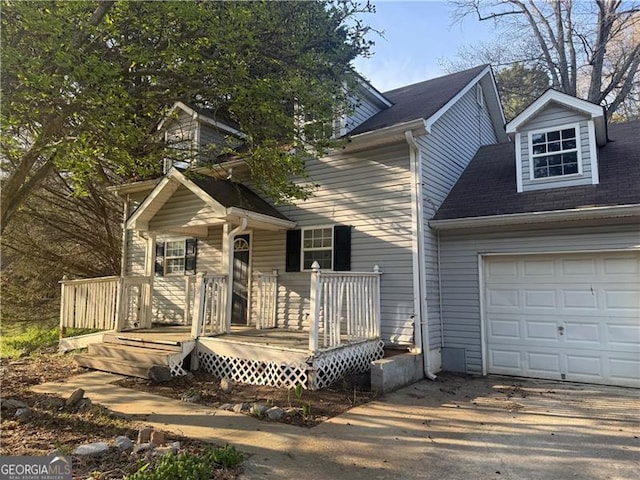 view of front of property featuring driveway and an attached garage