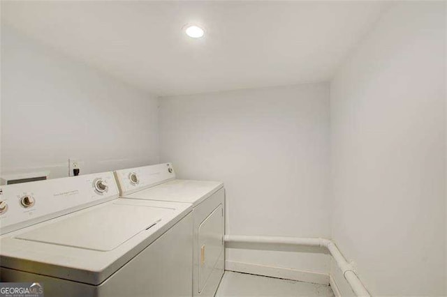 laundry area featuring laundry area and washer and dryer