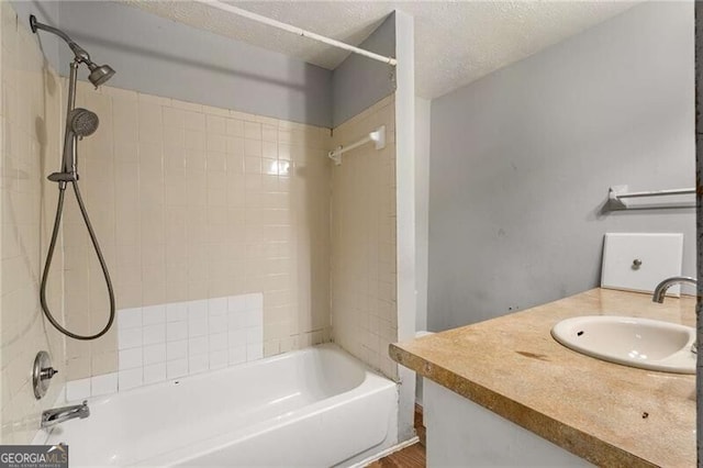 1090 Harwell St NW, Atlanta, GA 30314 - full bath featuring shower / bathing tub combination, vanity, and a textured ceiling