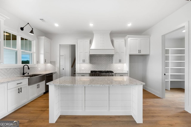 284 Community House Rd, Barnesville, GA 30204 - kitchen featuring custom exhaust hood, dishwasher, decorative backsplash, white cabinets, and recessed lighting