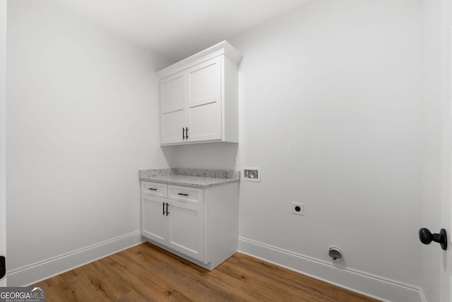 284 Community House Rd, Barnesville, GA 30204 - laundry area featuring electric dryer hookup, light wood-style floors, and washer hookup