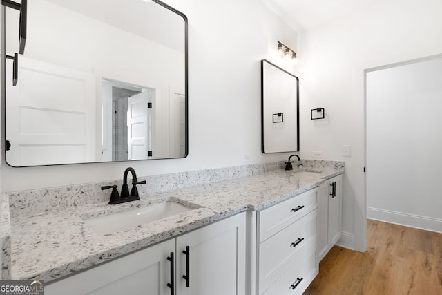 284 Community House Rd, Barnesville, GA 30204 - full bath featuring double vanity and wood finished floors