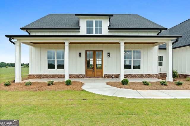 284 Community House Rd, Barnesville, GA 30204 - modern farmhouse featuring french doors, roof with shingles, and board and batten siding